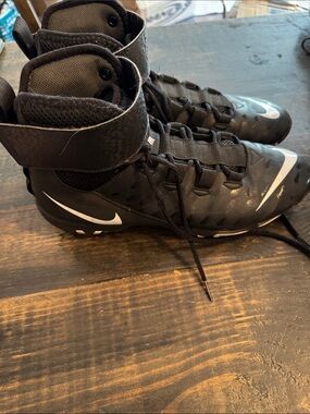 Nike Black and White High-Top Athletic Cleats